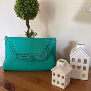 A New Day teal convertible purse